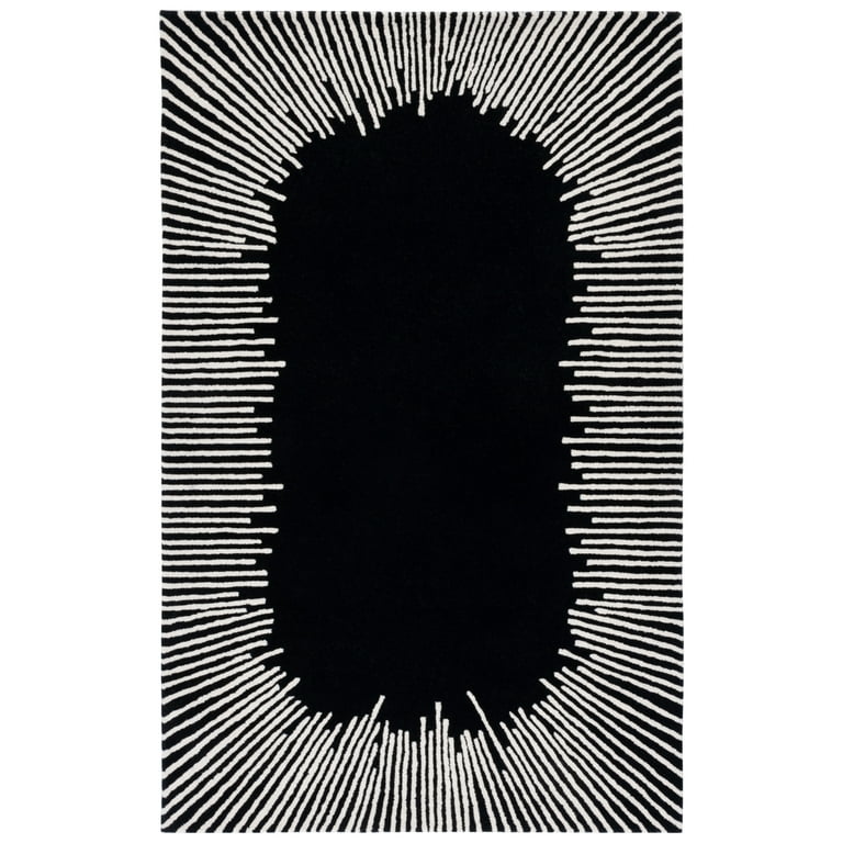 Black silhouette handmade rugs of a face with white lines radiating outward on a white background
