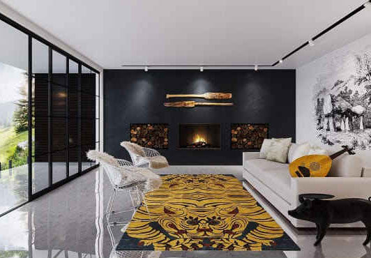 Modern living room with a black wall, white sofa, and decorative handmade rug