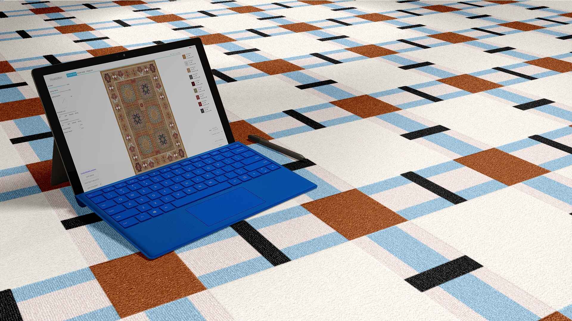 Laptop with a blue keyboard on a geometric-patterned floor