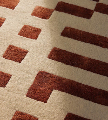 Modern Geometric Round Wool Rug – Brick Red Pattern on Cream – Hand-Tufted Accent Carpet