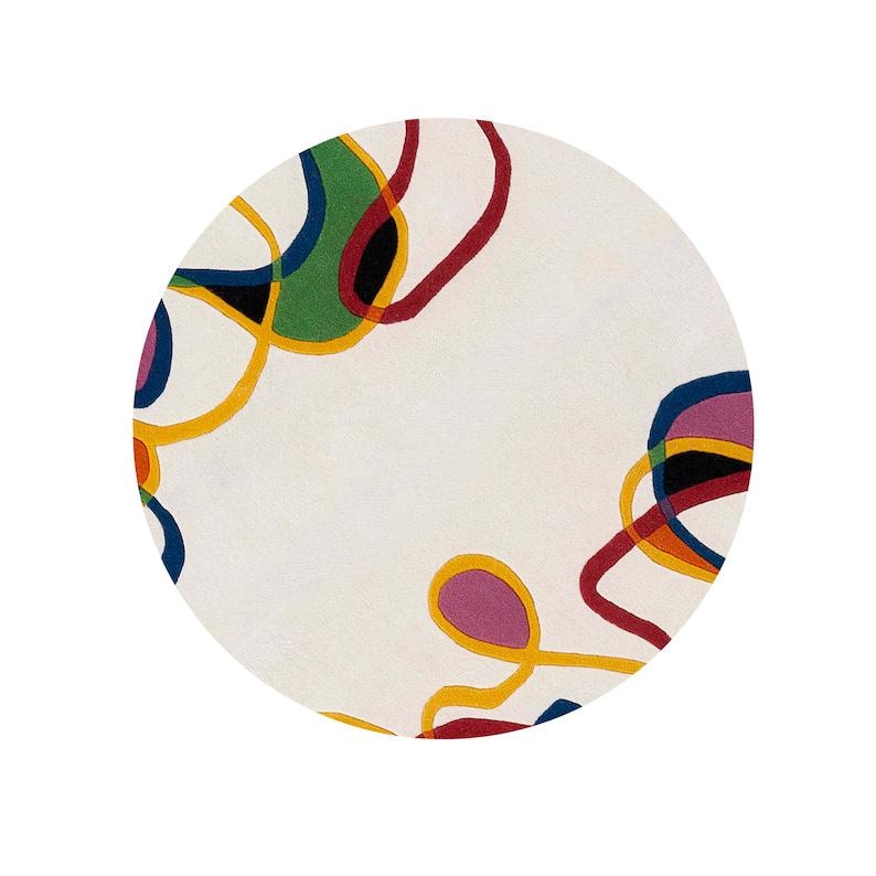 Ivory round hand tufted rug with colorful burgundy mustard blue green and purple abstract curved lines