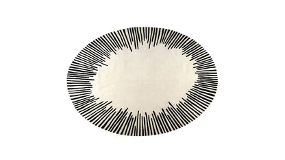 Hand-tufted Modern Oval Cream Rug featuring a black sunburst design, crafted from handmade wool