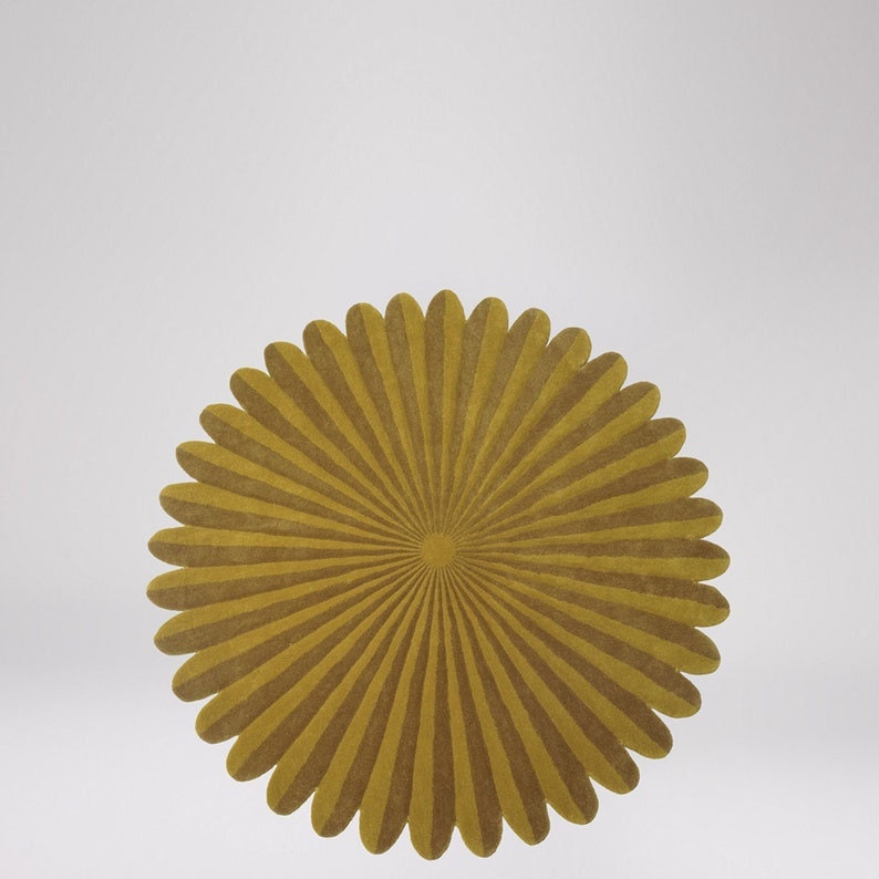 Mustard yellow round hand tufted rug with sunburst radial pattern