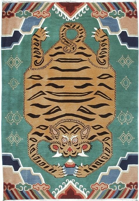 Rug with a large tiger design on a geometric patterned background